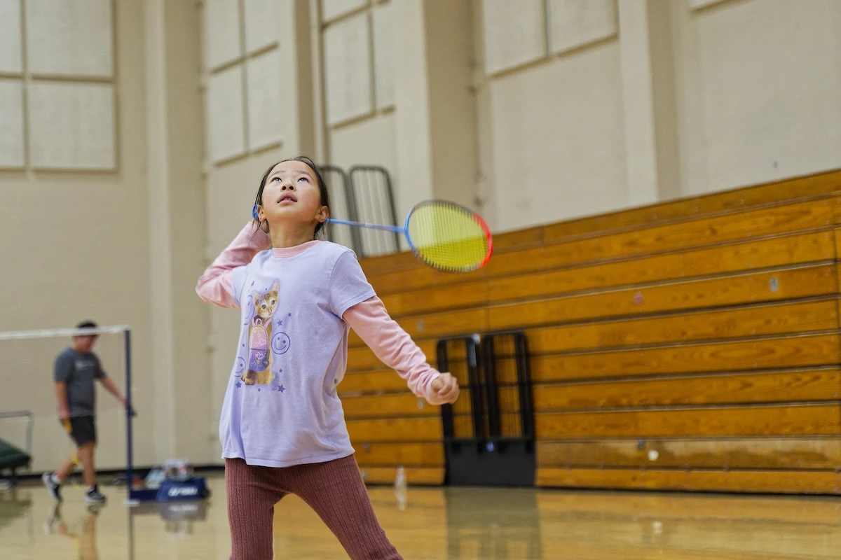 Badminton player ready to return the next shot